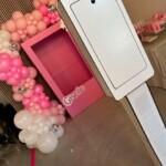 Photo Booth 12 with pink balloon background